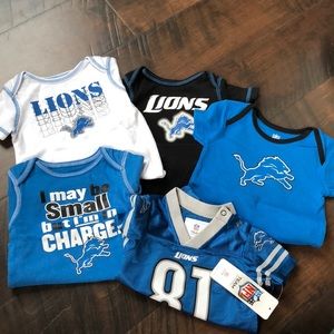 Lions short sleeve onesies  great condition.